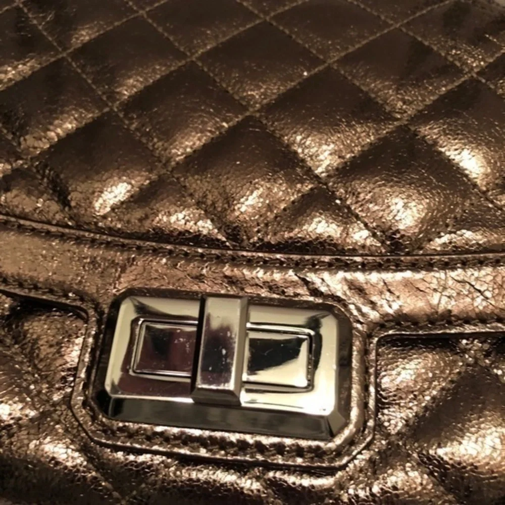 Michael kors metallic bronze quilted bag